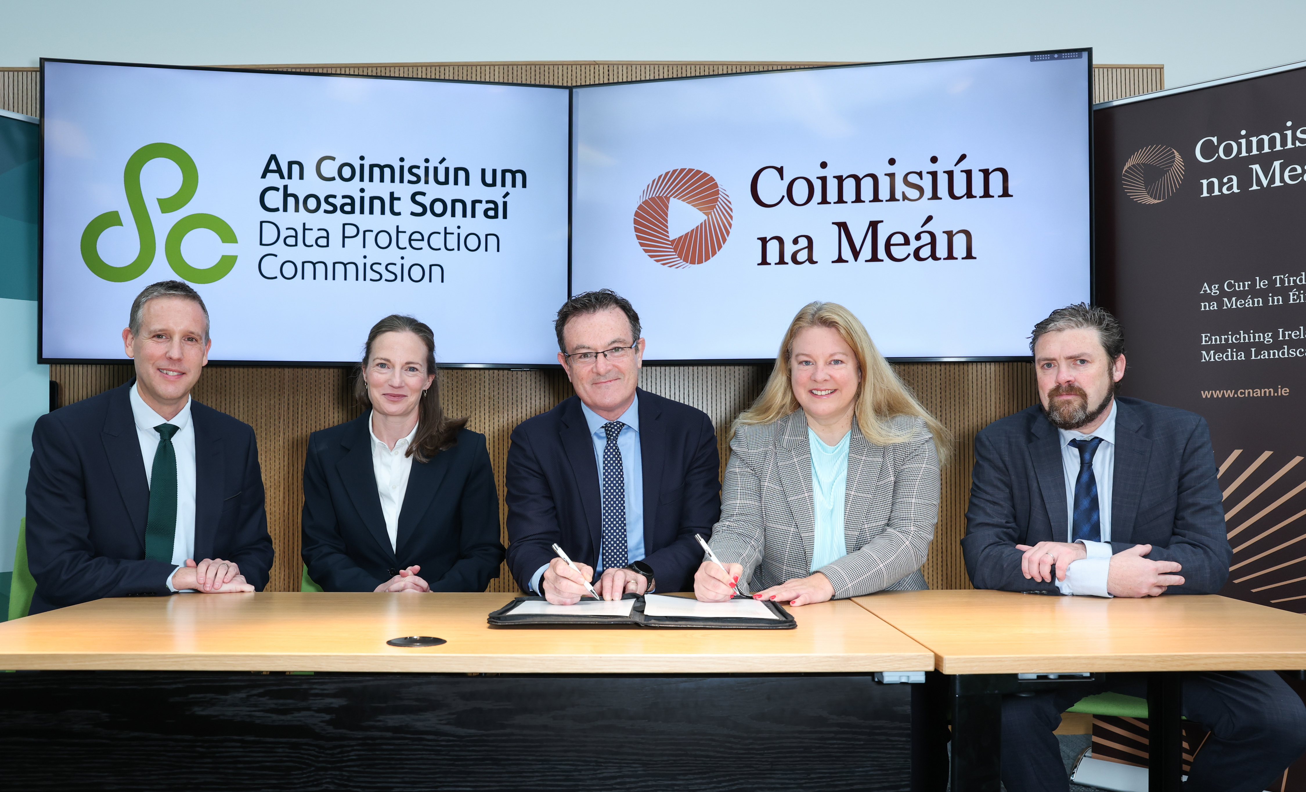 DPC Commissioners Niamh Sweeney, Dale Sunderland, Des Hogan, and Coimisiún na Meán Commissioners Niamh Hodnett and John Evans.