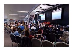  Delegates beginning to fill up the room on the morning of the Conference. 